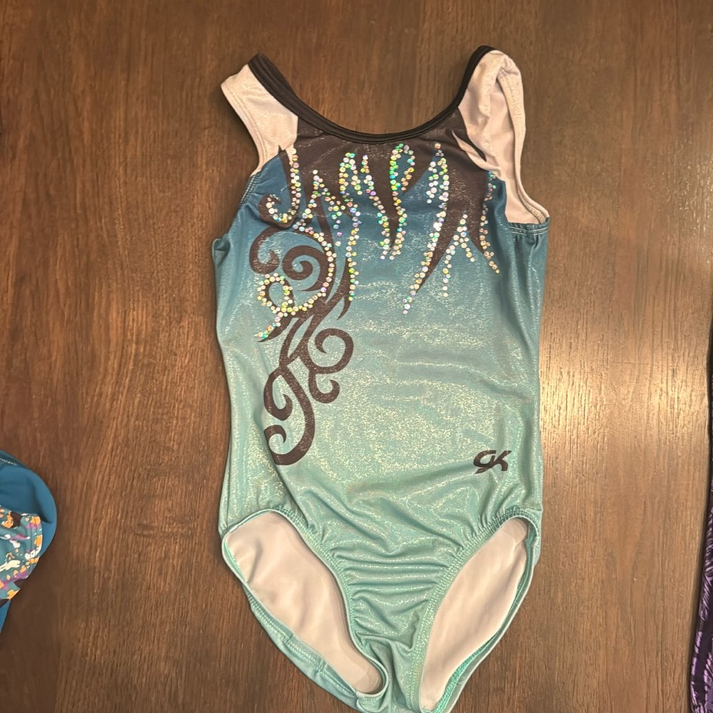CL. GK gymnastics leotard. Teal, silver shimmer.